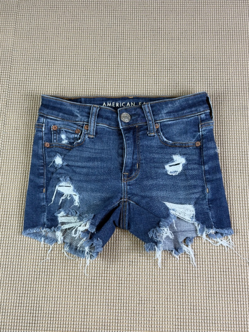 AMERICAN EAGLE ripped cutoff distressed denim jeans shorts size 000
